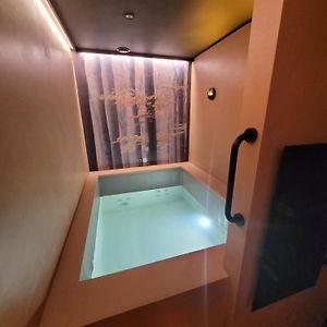 Kamer met een Queen Size Bed